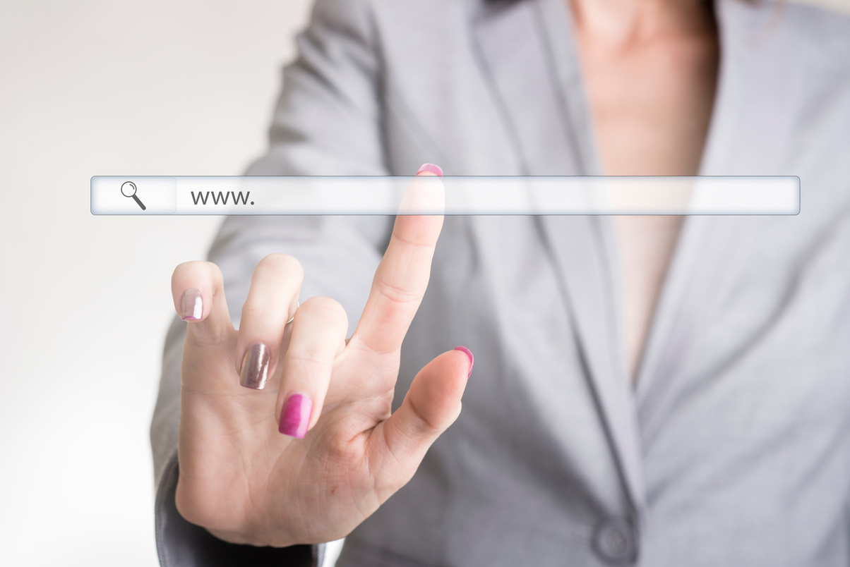 Female Hand Touching a Website Navigation Bar